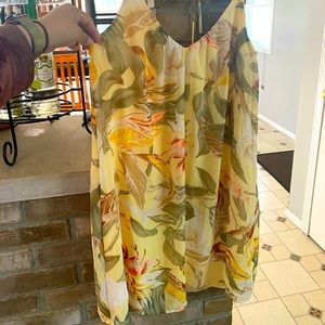 Yellow flowy floral dress.
